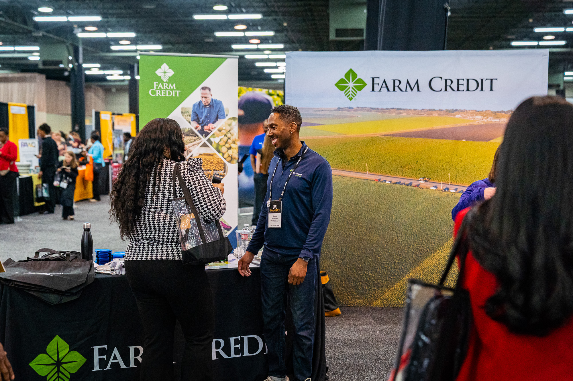The Farm Credit booth on a busy expo floor