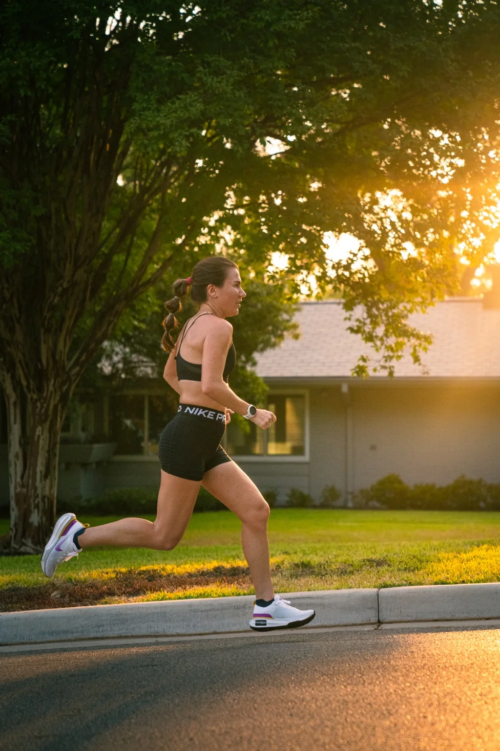 Runner passing through warm sunset light